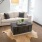 a room with a white couch and a coffee table
