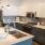a kitchen with a sink and a refrigerator